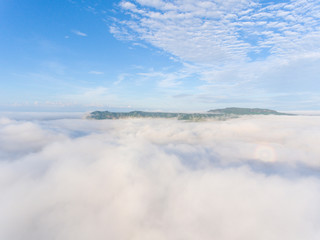 Naklejka na ściany i meble Sunrise above cloudsมSunrise over the clouds, photos from drones