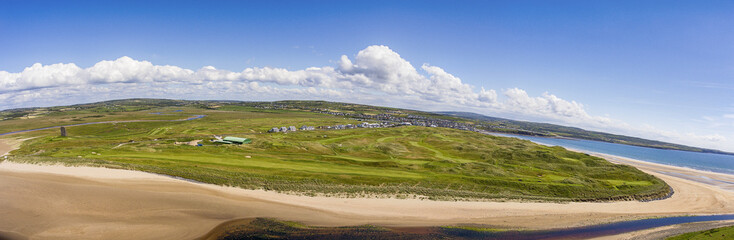 scenic aerial birds eye panoramic irish landscape from lahinch lehinch in county clare, ireland. beautiful lahinch beach and golf course that will host the 2019 Dubai Duty Free Irish Open