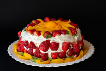 Very sweet cream cake with fruits.