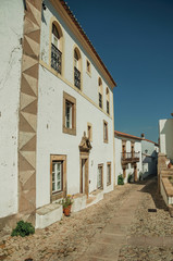 Baroque facade of old houses with whitewashed wall in Marvao