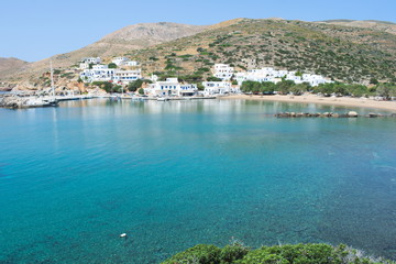 Greece, the island of Sikinos. The port and town beach on a bright spring day