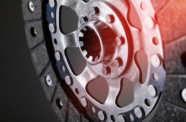 Close-up shot of clutch disk and basket on background