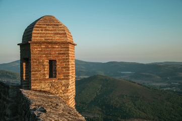 Watchtower made of bricks over cliff in Marvao