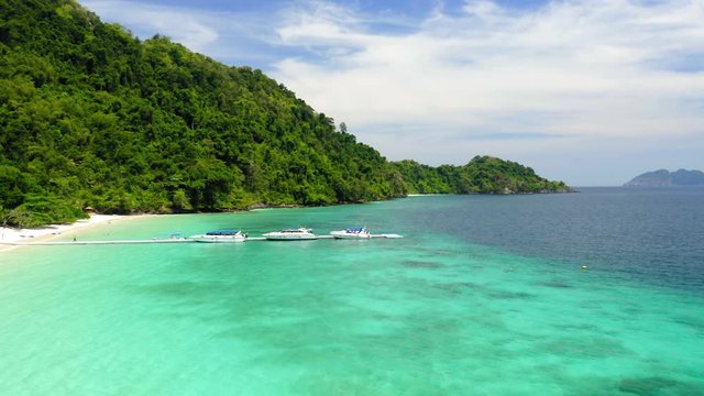 Aerial view from a drone of beautiful Nyaung Oo Phee island on sunny day in Myanmar