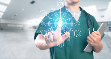 young doctor with hospital background