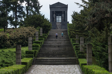 The Monument to the Unknown Hero from WWI. Complex of 8 caryatids in national costumes, representing 6 republics and 2 autonomous regions in the Kingdom of Yugoslavia. Avala mountain, Belgrade, Serbia