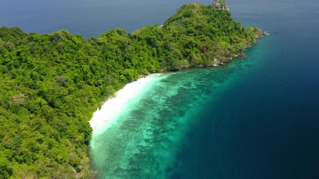 Aerial view from a drone of beautiful Nyaung Oo Phee island on sunny day in Myanmar