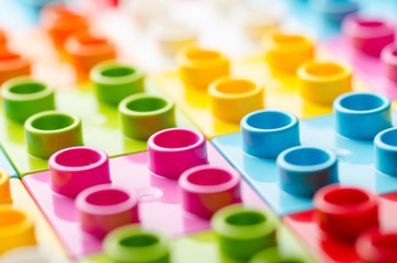 Bright multi-colored children's plastic blocks close-up