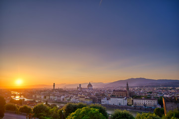 Naklejka premium The sunset over Florence, capital of Italy’s Tuscany region.
