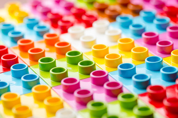 Bright multi-colored children's plastic blocks close-up