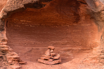 A small rock cairn in a niche.  Sedona, AZ, USA.
