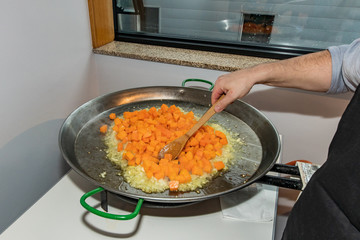cooking paella in the kitchen