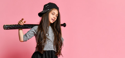 Young bright american girl with baseball bat