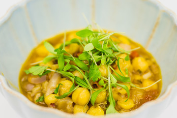 A close up photo of a dish of a delicious and healthy homemade chickpeas.