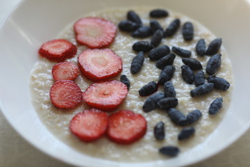 Tasty oatmeal healthy porrige with berries