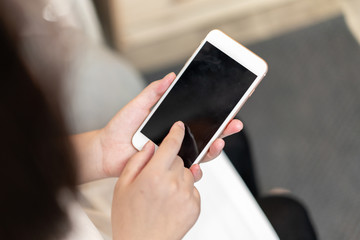 Girl pointing finger on screen smartphone