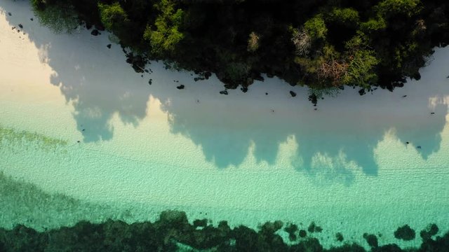 Aerial view from a drone of beautiful Nyaung Oo Phee island on sunny day in Myanmar