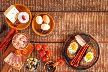 Fried bread with egg and bacon. Hearty meal. Vegetables and fried egg. Healthy breakfast.