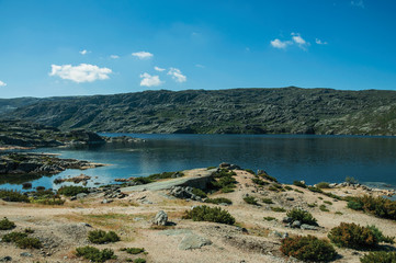 Fototapeta na wymiar Blue fresh water at the Long Lake on highlands