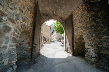 Gate entrance to medieval village Villefranche de Conflent, Pyrenees Orientales, Occitanie, France