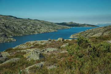 Naklejka premium Hilly landscape with lake on highlands