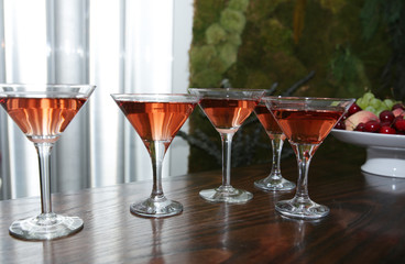 glasses of martini wine on table in restaurant