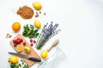 ingredients for home made lemonade on white background