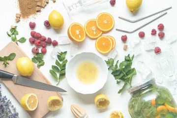 ingredients for home made lemonade on white background