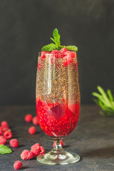 raspberry and chia seed cocktail dessert (sweet drink, dessert snack). top food background. copy space