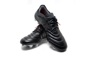 isolated football stud shoes on white background © charnsitr