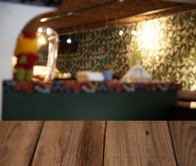 vintage wooden table on blurred cafe background dining room restaurant