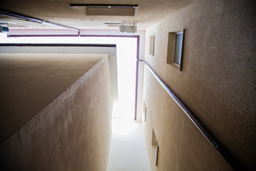 narrow passage between two tall houses