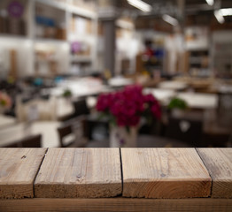 blurred cafe restaurant club background with wooden table