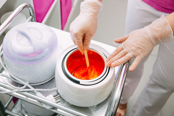 wax honey for epilation lies on the table there is a place for the inscription
