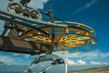 Close-up of the return bullwheel on upper terminal of chairlift
