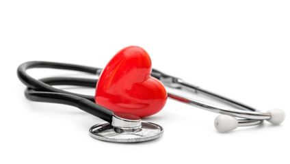 Stethoscope and red heart on white. Medical concept.