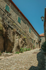 Old stone houses in deserted alley at Monsanto