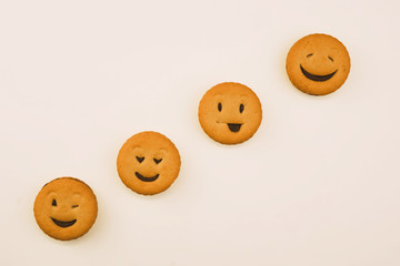 Obraz premium tasty cookies with different emotions on an isolated background