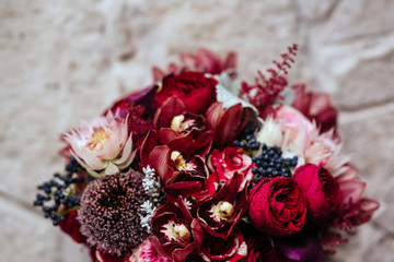 Bridal bouquet, fresh flowers of red color