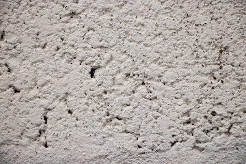 White painted grunge wall rough texture
