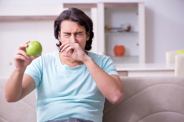 Young man suffering from allergy 