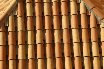 Red tile roof. Roof tiles on the roof