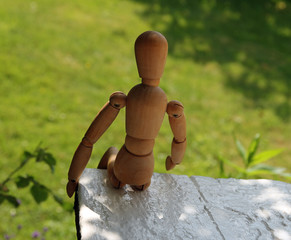 wood-clawed doll decelerating in the park