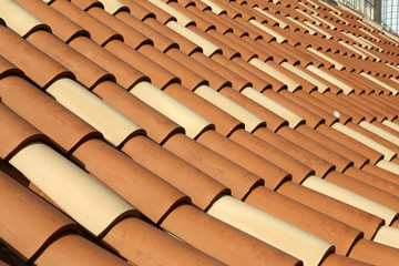 Red tile roof. Roof tiles on the roof