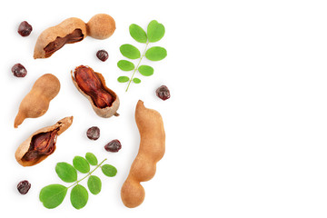 Tamarind fruit with leaf and seed isolated on white background with copy space for your text. Top view. Flat lay