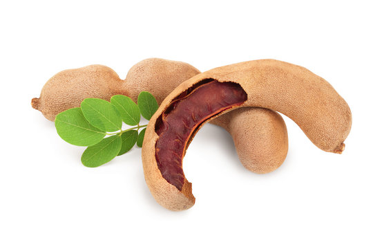Tamarind fruit with leaf isolated on white background