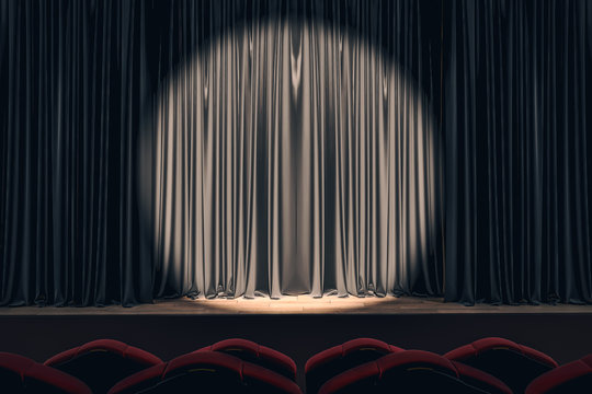 Black stage with empty curtains