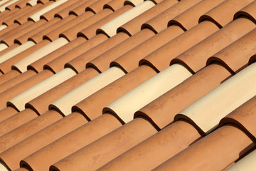 Red tile roof. Roof tiles on the roof