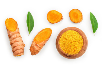 Turmeric powder and turmeric root isolated on white background with copy space for your text. Top view. Flat lay
