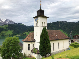 Parish church St. Catherine or St. Katharina in Innerthal village on alpine Lake Wagitalersee...